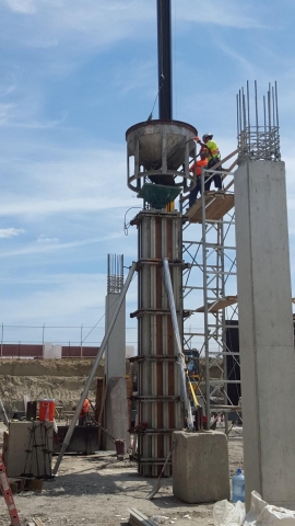 Pouring cement in Bolton Ontario Please change orientation
