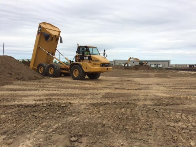 Working on Site of Future Home of DiGregorio Group of Companies.